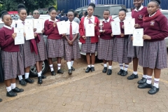 Prizes-and-Certificates-Given-to-Kiine-Girls-for-Doing-Well-in-Various-Subjects-among-ACK-Schools-in-Kirinyaga