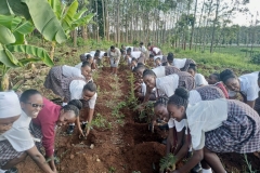 kiine-girls-with-the-principal-on-tree-planting-day-on-18-10-2023-1